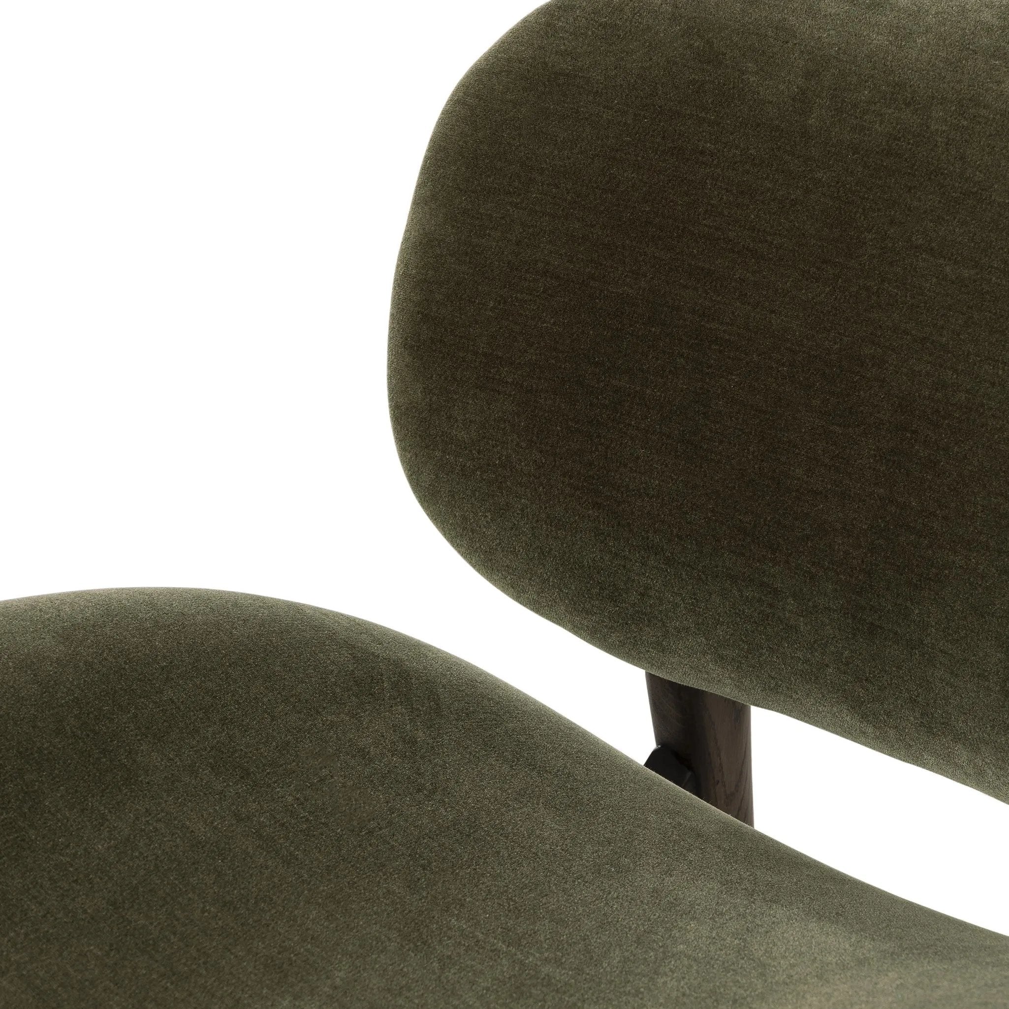 Featuring Celine Monte Olive Chair by Four Hands at Amethyst Home. This perfect accent chair, designed for unwinding. Upholstered in a velvety olive chenille made from recycled materials, with wide proportions and cozy curves and cushioning. Slim, tapered wooden legs balance the look.Overall Dimensions: 29.00"w x 33.50"d x 29.00"hWeight : 32.41 lbsMaterials: 5. Amethyst Home provides interior design, new home construction design consulting, vintage area rugs, and lighting in the Boston metro area.