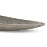 Statement-making centerpiece bowl featuring dramatic swooping lines, taking inspiration from Japanese fishing canoes. Cast in solid aluminum and supported by a single pedestal foot, giving the illusion that it's truly floating off the table.As lovers of clean design at Amethyst, we love the designer inspired Cerys Bowl - Raw Antique Nickel. Amethyst Home provides interior design, new home construction design consulting, vintage area rugs, and lighting in the Omaha metro area.