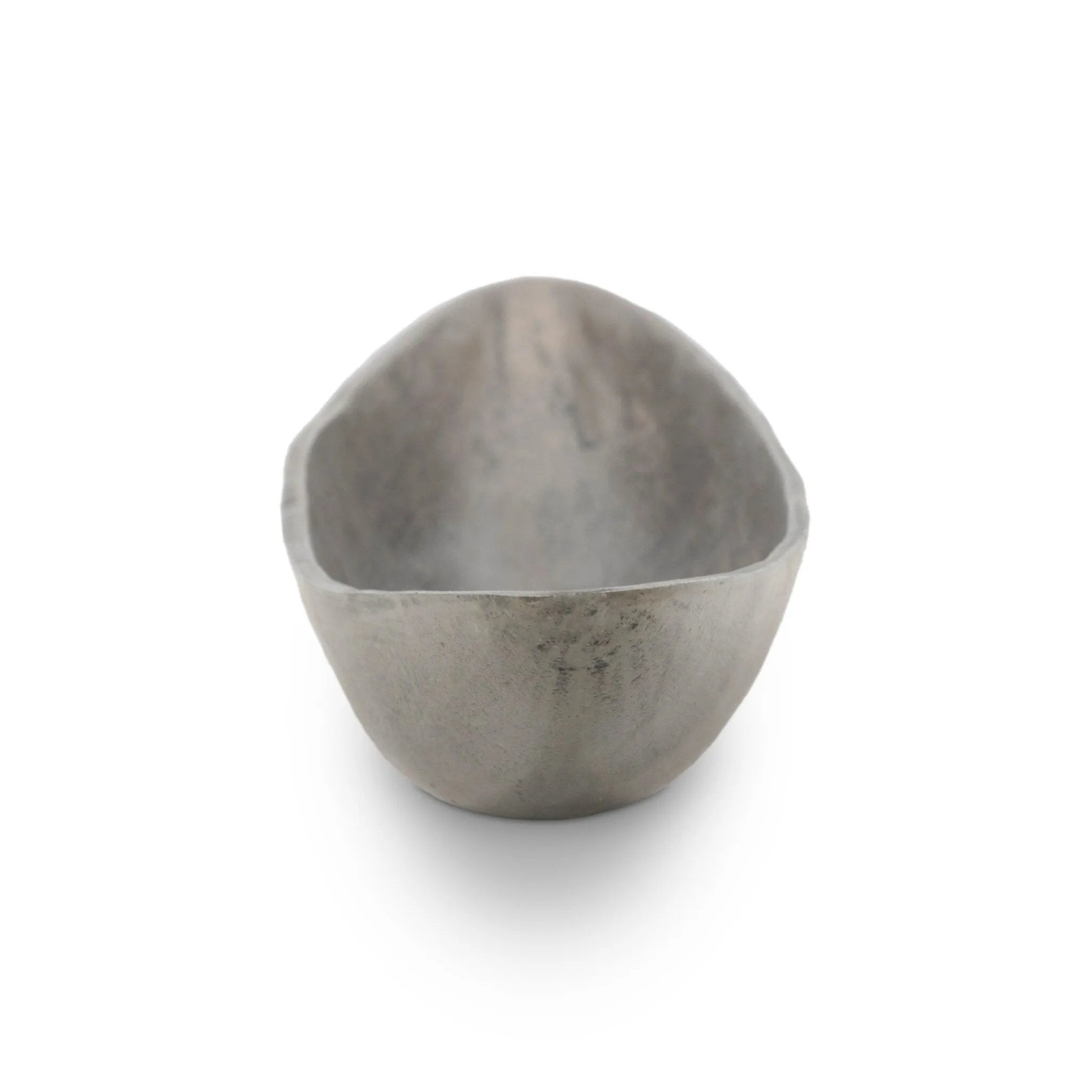 Statement-making centerpiece bowl featuring dramatic swooping lines, taking inspiration from Japanese fishing canoes. Cast in solid aluminum and supported by a single pedestal foot, giving the illusion that it's truly floating off the table.As lovers of clean design at Amethyst, we love the designer inspired Cerys Bowl - Raw Antique Nickel. Amethyst Home provides interior design, new home construction design consulting, vintage area rugs, and lighting in the Winter Garden metro area.