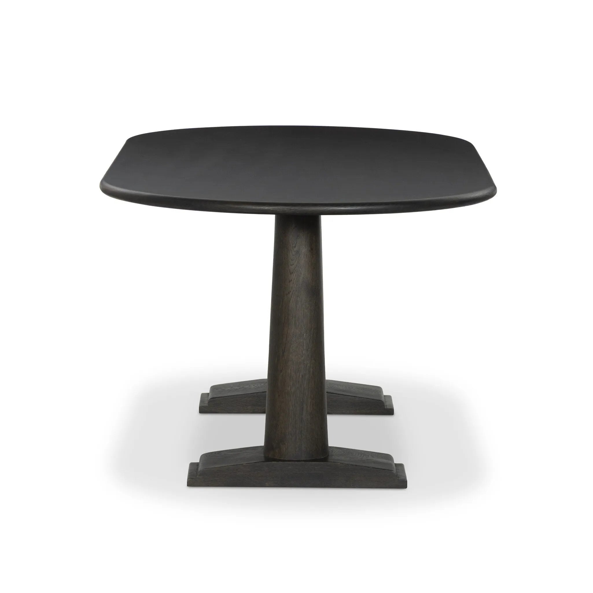 Finished in a rich espresso, a mix of solid oak and oak veneers fashion a trestle-style base with tapered column legs and step detailing, for a traditional look.As fans of natural design at Amethyst, we love the nature inspired Chamberlain Dining Table - Espresso Oak Veneer. Amethyst Home provides interior design, new home construction design consulting, vintage area rugs, and lighting in the San Diego metro area.