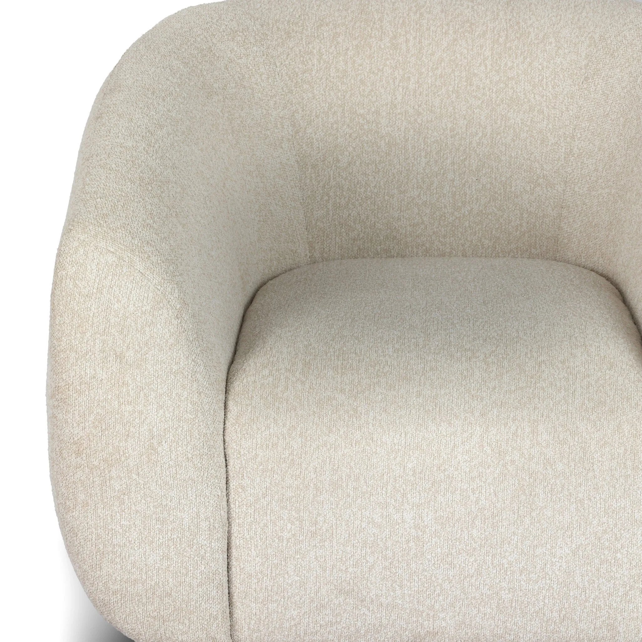 Meet modern comfort. Clean curves, impeccable tailoring and a soft, slightly heathered outdoor-friendly boucle bring an elevated, vintage European-inspired look to this outdoor swivel chair. Cover or store inside during inclement weather and when not in use. Amethyst Home provides interior design, new home construction design consulting, vintage area rugs, and lighting in the Houston metro area.