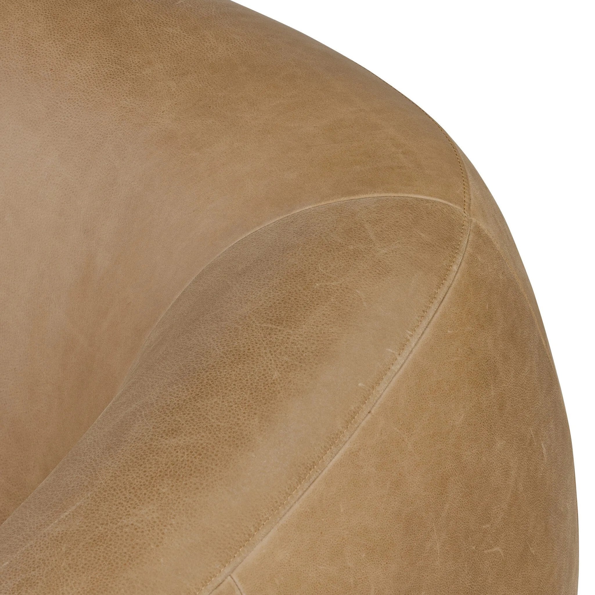Meet modern comfort. Clean curves, impeccable tailoring and taupe top-grain leather with a pronounced grain bring an elevated, European-inspired look to this sofa Amethyst Home provides interior design, new home construction design consulting, vintage area rugs, and lighting in the Houston metro area.