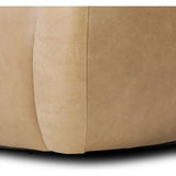 Meet modern comfort. Clean curves, impeccable tailoring and taupe top-grain leather with a pronounced grain bring an elevated, European-inspired look to this swivel chair Amethyst Home provides interior design, new home construction design consulting, vintage area rugs, and lighting in the Austin metro area.