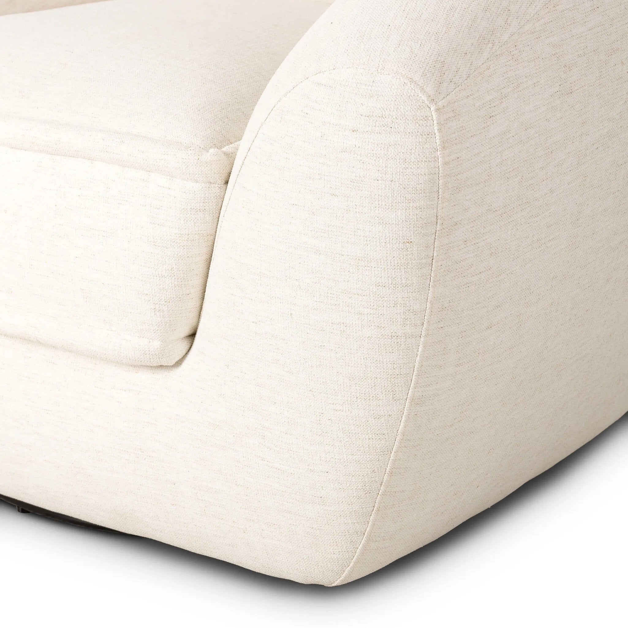 Inspired by French modernism with a nod to Jean Royere's design classic, the Polaire. Our take is defined by exaggerated curves, tapered arms and oversized welt detailing along the reversible seat cushion for a tailored look, finished with a 360-degree swivel. Amethyst Home provides interior design, new home construction design consulting, vintage area rugs, and lighting in the Austin metro area.