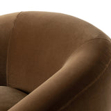 Inspired by French modernism with a nod to Jean Royere's design classic, the Polaire. Our take is defined by exaggerated curves, tapered arms and oversized welt detailing along the reversible seat cushion for a tailored look, finished with a 360-degree swivel. Amethyst Home provides interior design, new home construction design consulting, vintage area rugs, and lighting in the Boston metro area.