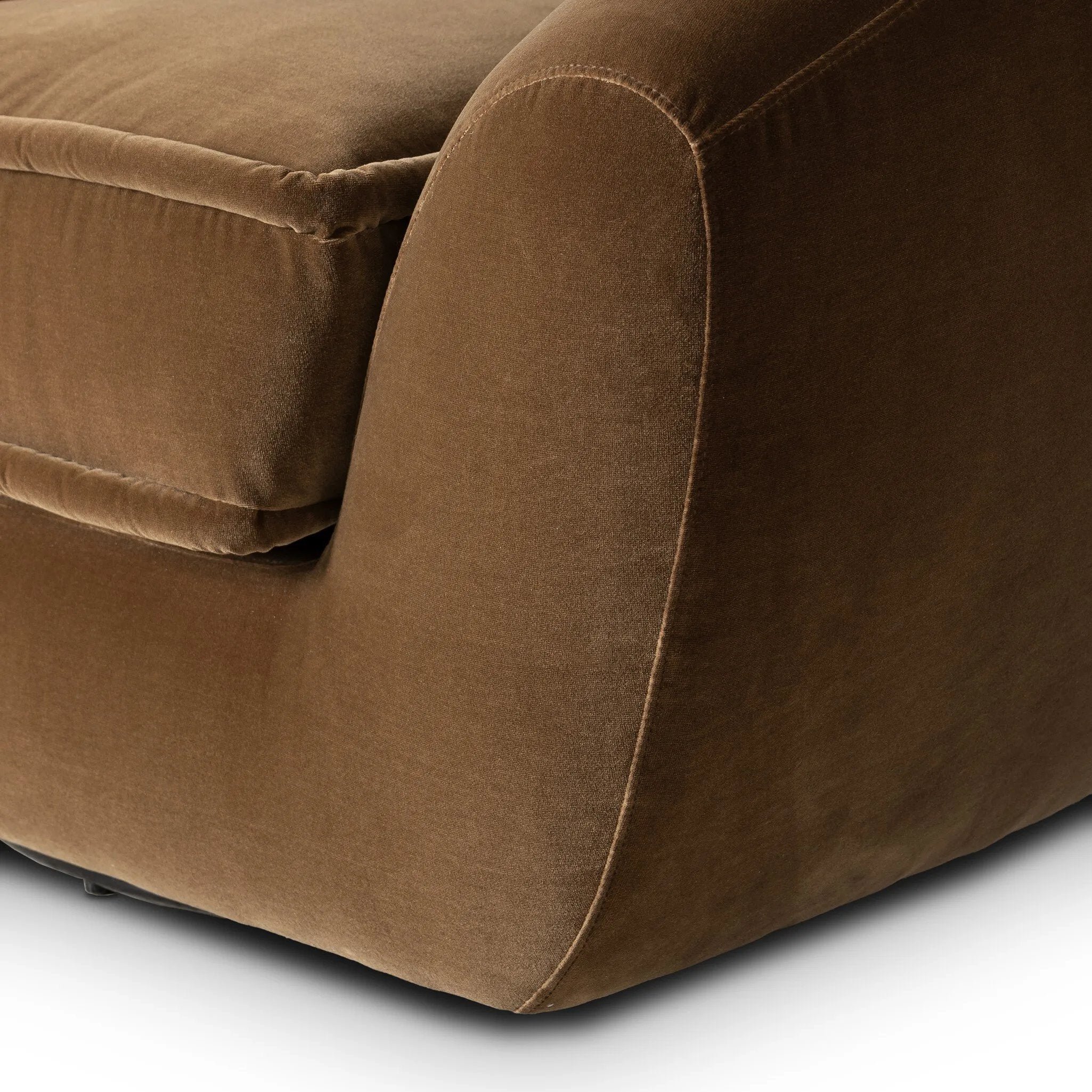 Inspired by French modernism with a nod to Jean Royere's design classic, the Polaire. Our take is defined by exaggerated curves, tapered arms and oversized welt detailing along the reversible seat cushion for a tailored look, finished with a 360-degree swivel. Amethyst Home provides interior design, new home construction design consulting, vintage area rugs, and lighting in the Nashville metro area.