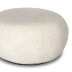 Simple, inflated shaping gets a textural upgrade on this outdoor ottoman, with boucle fabric all over on top of a pedestal base. Cover or store inside during inclement weather and when not in use.As lovers of clean aesthetics at Amethyst, we love the optimistic inspired Chip Outdoor Ottoman - Jasper Natural. Amethyst Home provides interior design, new home construction design consulting, vintage area rugs, and lighting in the Austin metro area.