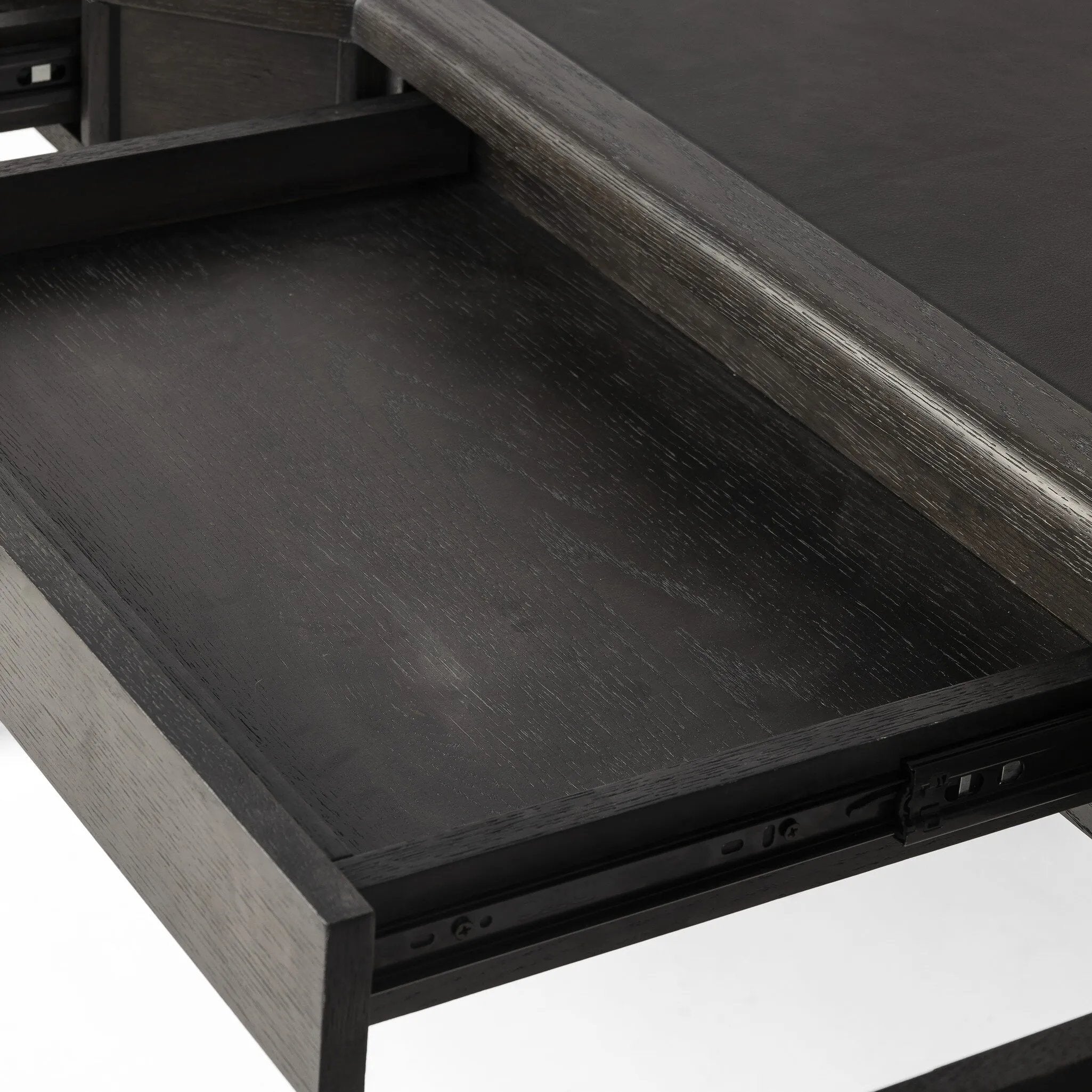 Featuring Claude Distressed Black Oak Veneer Desk by Four Hands at Amethyst Home. This refreshed directoire-style desk pairs a 100% top-grain leather inset top with a unique reverse breakfront and recessed center drawer. Finished in distressed black oak, it offers the workspace a classic yet updated feel.
Overall Dimensions: 28.0" L x 68.0 " W x 30.0" H
Materia. Amethyst Home provides interior design, new home construction design consulting, vintage area rugs, and lighting in the Tampa metro area.
