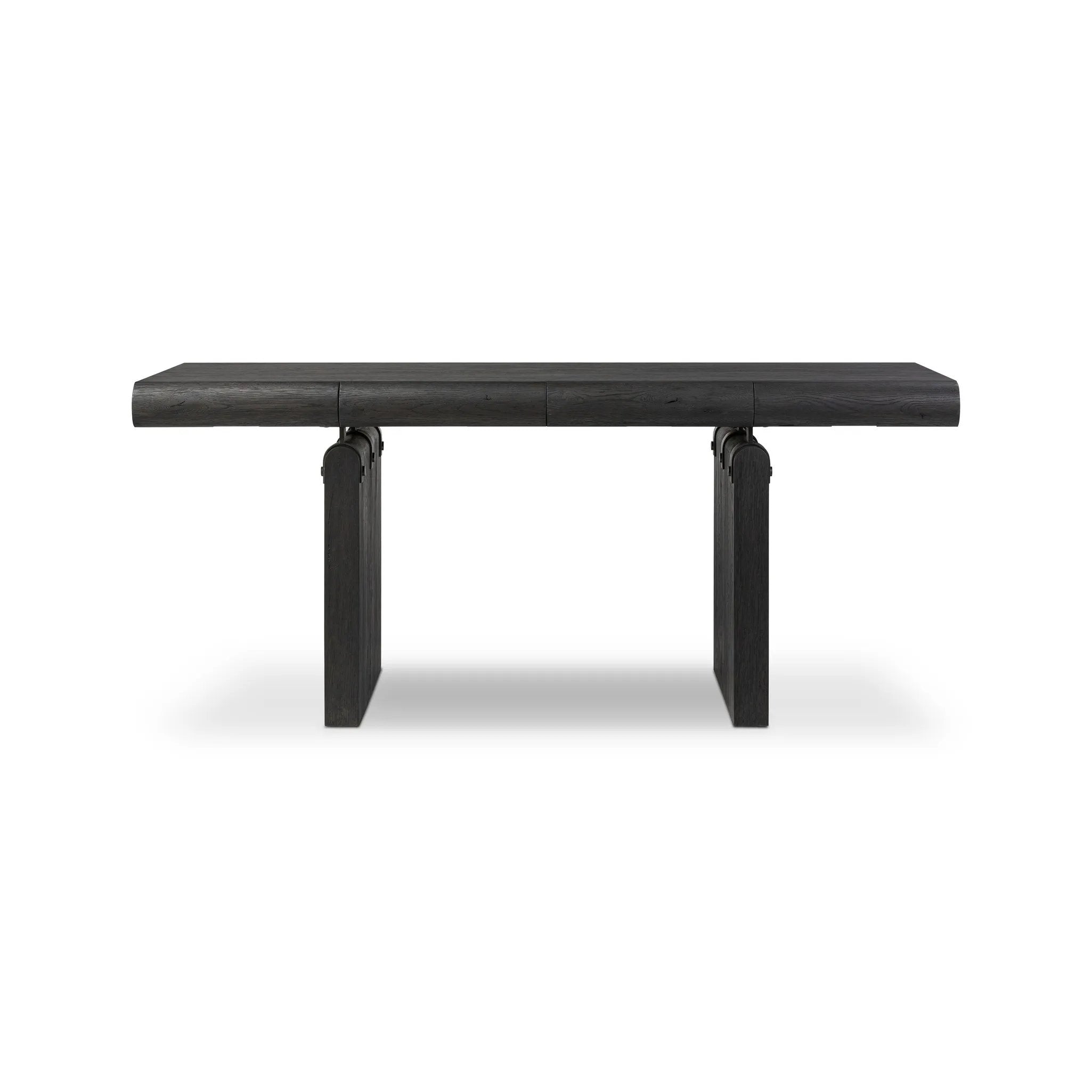 Bring a beautifully contoured look to your workspace with a desk inspired by Italian postmodernism. Connected by iron brackets, a dual-panel base supports a spacious tabletop of worn black oak, crafting a float-like look. Four drawers keep frequently used items within reach Amethyst Home provides interior design, new home construction design consulting, vintage area rugs, and lighting in the Los Angeles metro area.