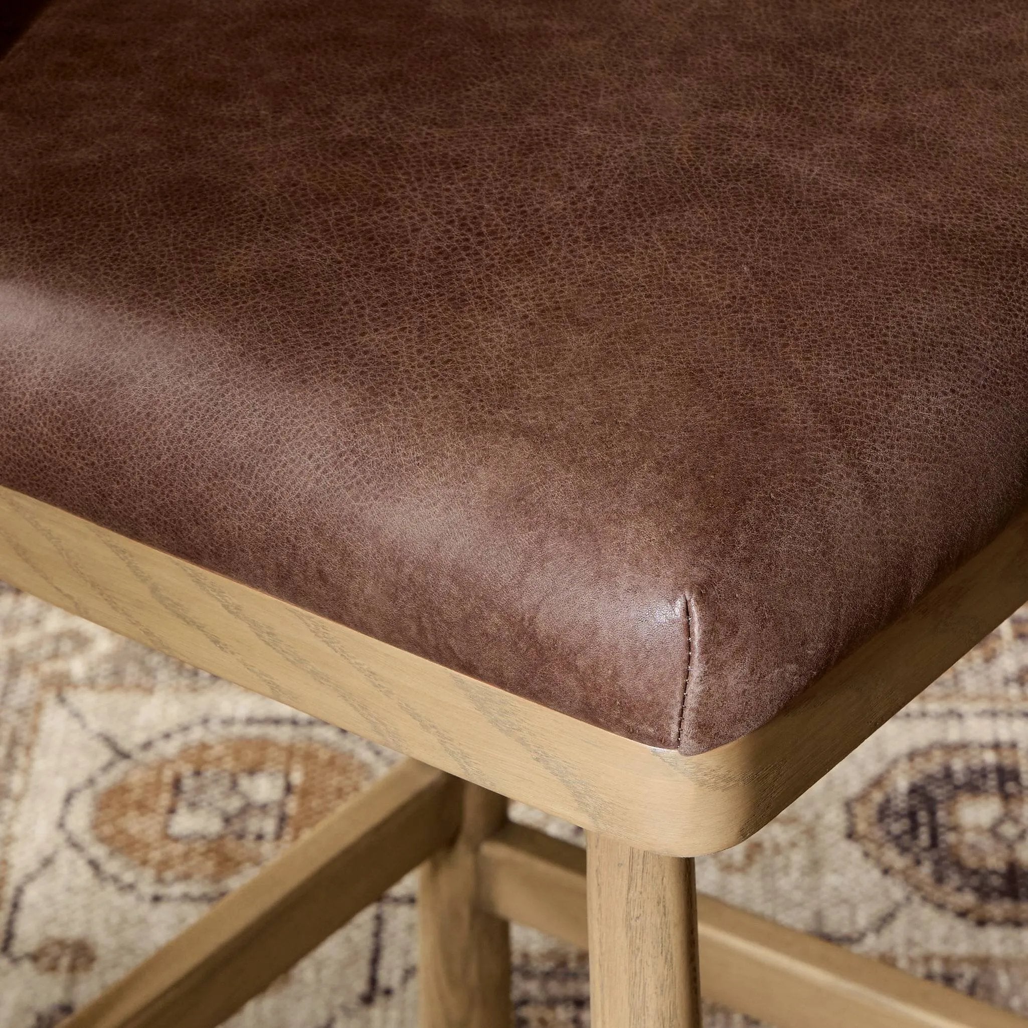 Featuring Cloris Palermo Cigar Swivel Bar + Counter Stool by Four Hands at Amethyst Home. Channel vintage vibes with a swivel stool perfectly sized for the bar. Crafted of blonde-finished oak, a low, molded back adds a playful touch, while a top-grain leather seat offers luxe comfort. Finished off with a memory swivel to ensure the stool's curved wood . Amethyst Home provides interior design, new home construction design consulting, vintage area rugs, and lighting in the Salt Lake City metro area.