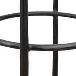 Contrasting materials come together to create an elevated counter stool. Designed with tapered cast iron legs and a solid oak