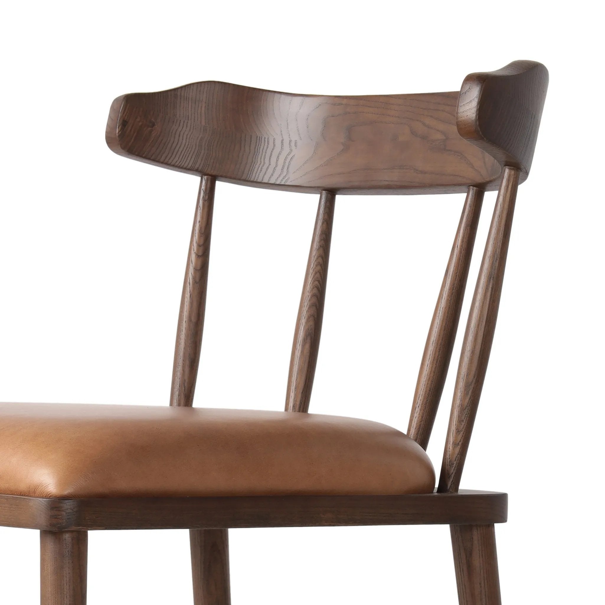 Featuring Colter Chaps Saddle Counter Stool by Four Hands at Amethyst Home. Made from solid ash with a vintage finish, this versatile counter stool pairs an airy back with tapered spindles, for a simple, inviting look. A fixed upholstered seat of top-grain leather adds a smart, comfortable touch.Overall Dimensions: 20.50"w x 22.75"d x 38.25"hWeight : 13.23. Amethyst Home provides interior design, new home construction design consulting, vintage area rugs, and lighting in the Des Moines metro area.