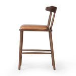 Featuring Colter Chaps Saddle Counter Stool by Four Hands at Amethyst Home. Made from solid ash with a vintage finish, this versatile counter stool pairs an airy back with tapered spindles, for a simple, inviting look. A fixed upholstered seat of top-grain leather adds a smart, comfortable touch.Overall Dimensions: 20.50"w x 22.75"d x 38.25"hWeight : 13. Amethyst Home provides interior design, new home construction design consulting, vintage area rugs, and lighting in the Winter Garden metro area.