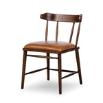 Featuring Colter Chaps Saddle Dining Chair by Four Hands at Amethyst Home. Made from solid ash with a vintage finish, this versatile dining chair pairs an airy back with tapered spindles, for a simple, inviting look. Fixed upholstered seat of top-grain leather adds a fresh, comfortable touch.Overall Dimensions: 20.50"w x 23.25"d x 31.25"hWeight : 13.01 lbsMate. Amethyst Home provides interior design, new home construction design consulting, vintage area rugs, and lighting in the Boston metro area.