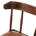 Featuring Colter Chaps Saddle Dining Chair by Four Hands at Amethyst Home. Made from solid ash with a vintage finish, this versatile dining chair pairs an airy back with tapered spindles, for a simple, inviting look. Fixed upholstered seat of top-grain leather adds a fresh, comfortable touch.Overall Dimensions: 20.50"w x 23.25"d x 31.25"hWeight : 13.01 lbsM. Amethyst Home provides interior design, new home construction design consulting, vintage area rugs, and lighting in the Charlotte metro area.