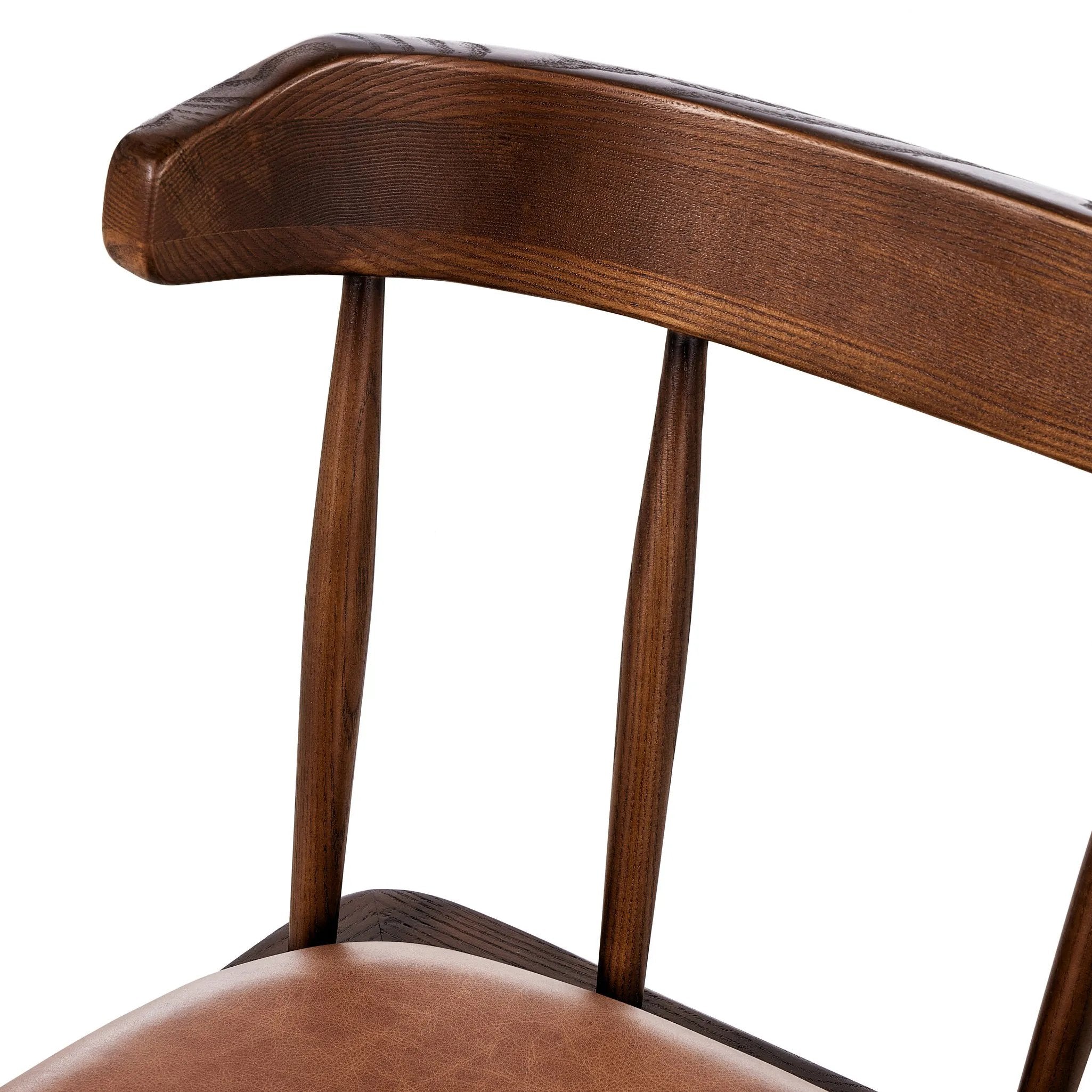 Featuring Colter Chaps Saddle Dining Chair by Four Hands at Amethyst Home. Made from solid ash with a vintage finish, this versatile dining chair pairs an airy back with tapered spindles, for a simple, inviting look. Fixed upholstered seat of top-grain leather adds a fresh, comfortable touch.Overall Dimensions: 20.50"w x 23.25"d x 31.25"hWeight : 13.01 lbsM. Amethyst Home provides interior design, new home construction design consulting, vintage area rugs, and lighting in the Charlotte metro area.