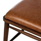 Featuring Colter Chaps Saddle Dining Chair by Four Hands at Amethyst Home. Made from solid ash with a vintage finish, this versatile dining chair pairs an airy back with tapered spindles, for a simple, inviting look. Fixed upholstered seat of top-grain leather adds a fresh, comfortable touch.Overall Dimensions: 20.50"w x 23.25"d x 31.25"hWeight : 13.01 lbs. Amethyst Home provides interior design, new home construction design consulting, vintage area rugs, and lighting in the Washington metro area.