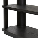 Unexpected contours give this bookcase its warm, modern vibe. Crafted oak veneer with a worn black finish, rounded legs are inset from the shelves with a plinth-like effect Amethyst Home provides interior design, new home construction design consulting, vintage area rugs, and lighting in the Omaha metro area.