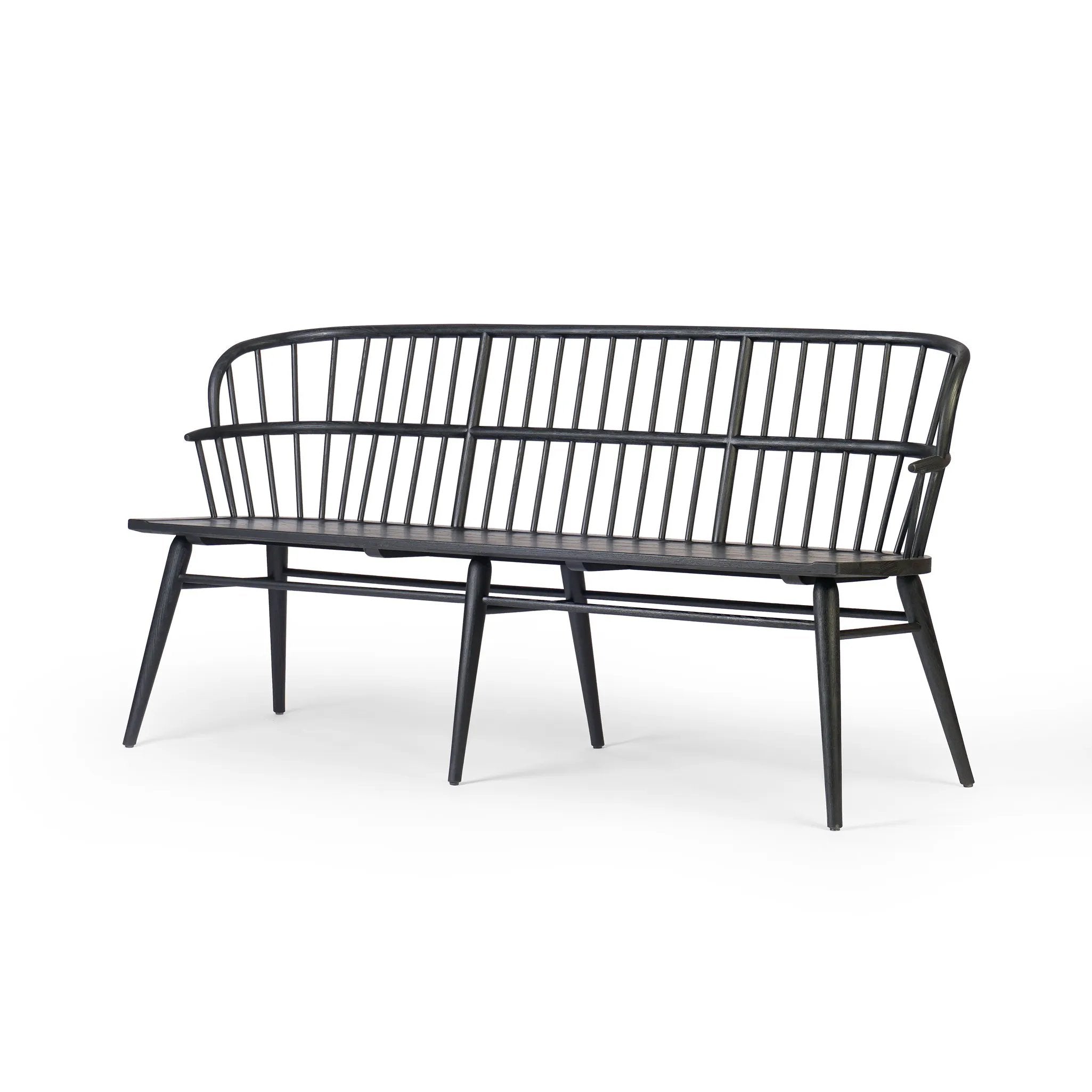The classic Windsor, modernized. Dining bench of black-finished solid ash features a double-tiered back and finely sculpted frame Amethyst Home provides interior design, new home construction design consulting, vintage area rugs, and lighting in the Houston metro area.