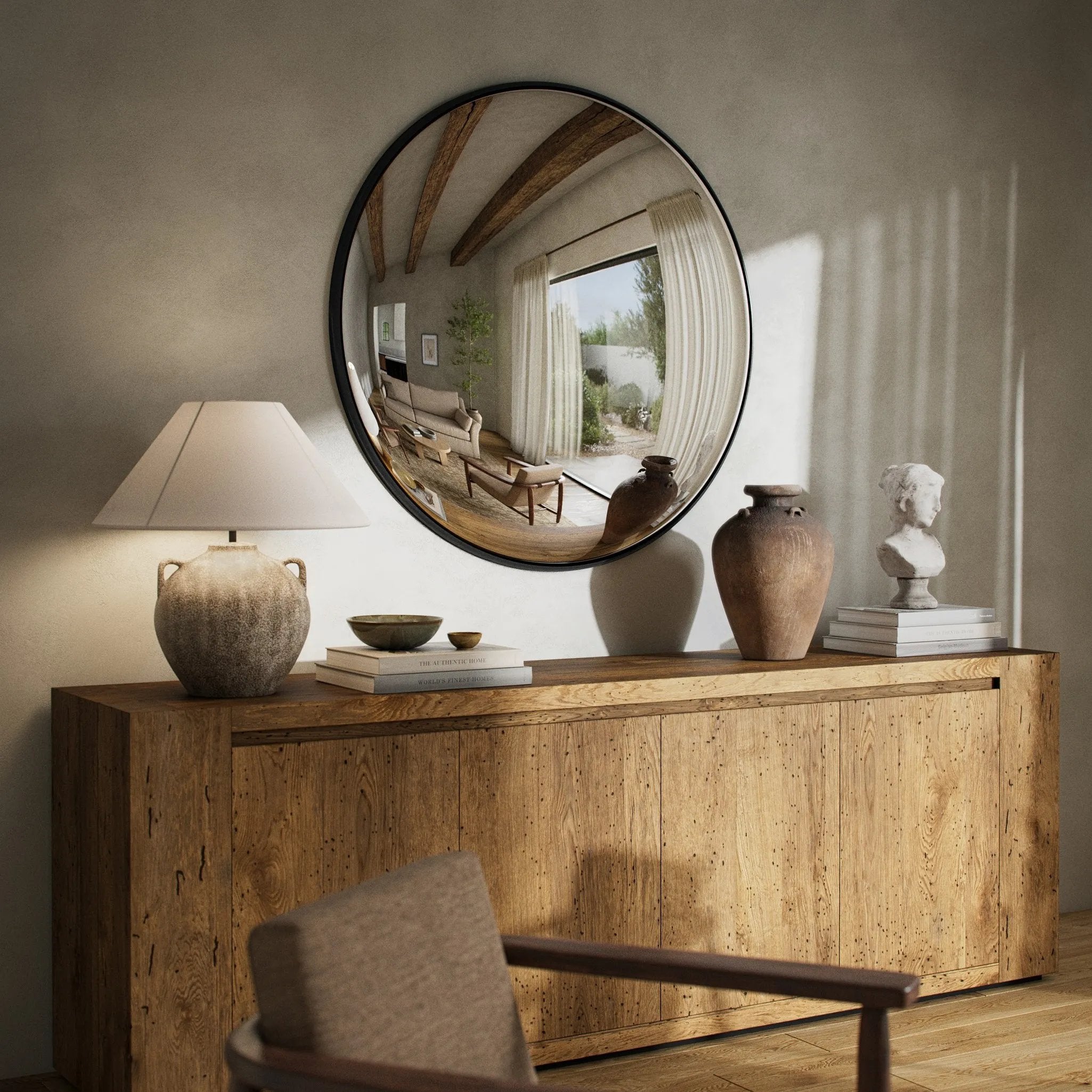 Featuring Convex Iron Matte Black Wall Mirror by Four Hands at Amethyst Home. A slim frame in black-finished iron cradles this oversized mirror's convex curve. Bold yet refined, it amplifies space and light as a captivating focal point.Overall Dimensions: 46.50"w x 5.00"d x 46.50"hWeight : 56.31 lbsMaterials : Iron. Amethyst Home provides interior design, new home construction design consulting, vintage area rugs, and lighting in the Park City metro area.