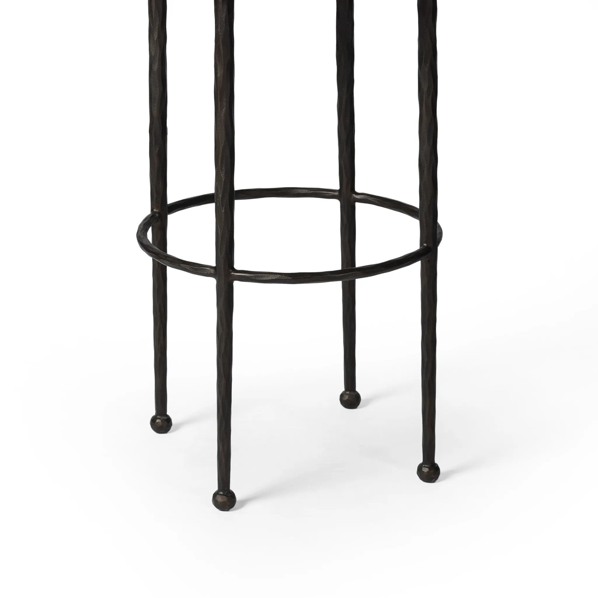 Featuring Corinne Ivan Stone Bar + Counter Stool by Four Hands at Amethyst Home. Hammered bronze legs with ball-shaped foot details elevate this simply shaped counter stool. A round, cushioned seat in a heavy boucle-like fabric finishes this counter-height stool's clean, inviting look.BarOverall Dimensions: 17.00"w x 17.00"d x 31.25"hWeight: 32.19 lbsC. Amethyst Home provides interior design, new home construction design consulting, vintage area rugs, and lighting in the Salt Lake City metro area.