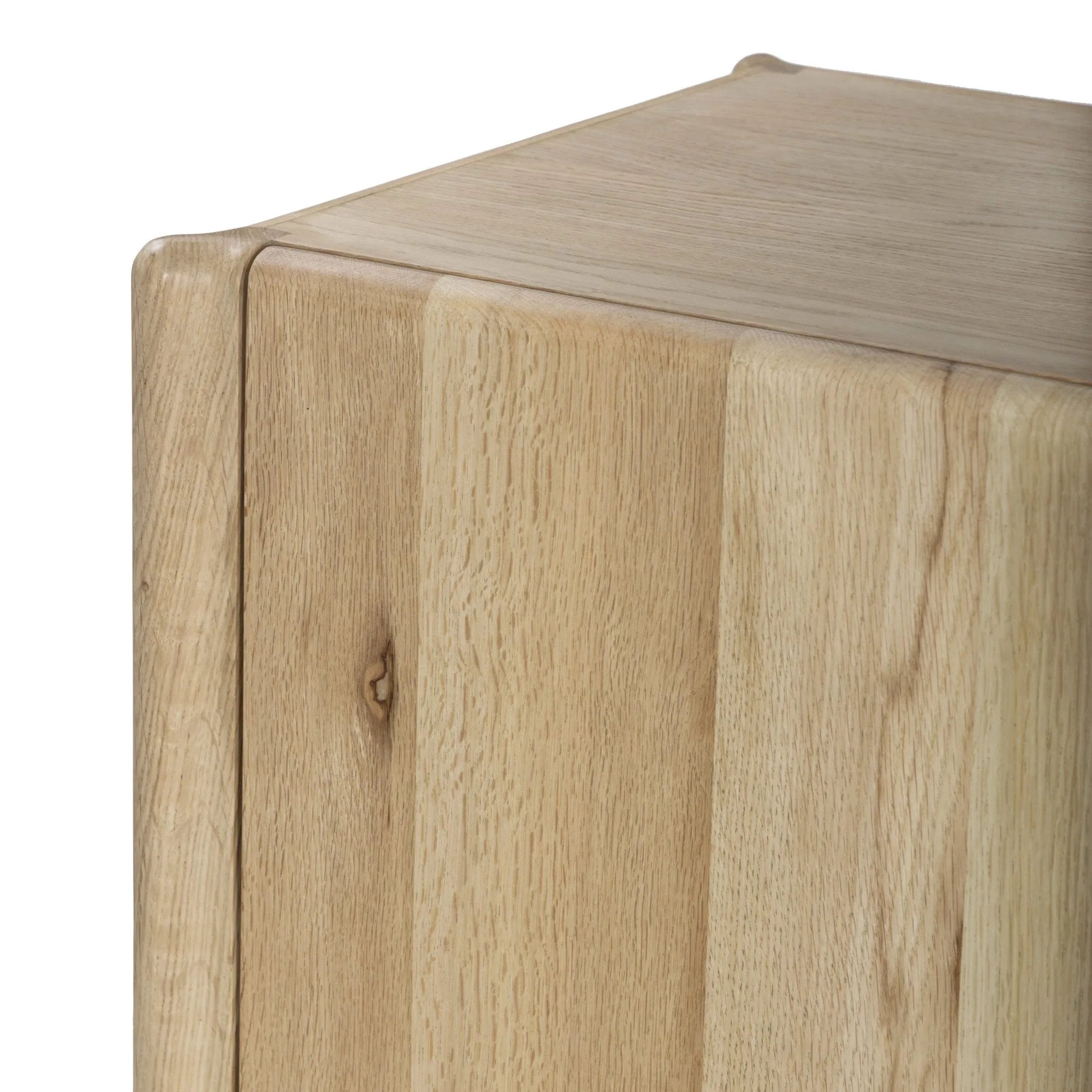 Add storage to your dining space, plus a look of beautiful simplicity. Crafted of light natural oak, with cylindrical legs and rounded detailing throughout the case. Spacious inside awaits storage of favorite table linens, serveware and more. Amethyst Home provides interior design, new home construction design consulting, vintage area rugs, and lighting in the Des Moines metro area.