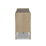 Add storage to your dining space, plus a look of beautiful simplicity. Crafted of light natural oak, with cylindrical legs and rounded detailing throughout the case. Spacious inside awaits storage of favorite table linens, serveware and more. Amethyst Home provides interior design, new home construction design consulting, vintage area rugs, and lighting in the Kansas City metro area.