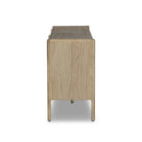 Add storage to your dining space, plus a look of beautiful simplicity. Crafted of light natural oak, with cylindrical legs and rounded detailing throughout the case. Spacious inside awaits storage of favorite table linens, serveware and more. Amethyst Home provides interior design, new home construction design consulting, vintage area rugs, and lighting in the Kansas City metro area.