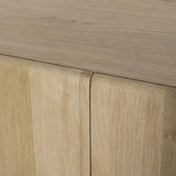 Add storage to your dining space, plus a look of beautiful simplicity. Crafted of light natural oak, with cylindrical legs and rounded detailing throughout the case. Spacious inside awaits storage of favorite table linens, serveware and more. Amethyst Home provides interior design, new home construction design consulting, vintage area rugs, and lighting in the Monterey metro area.