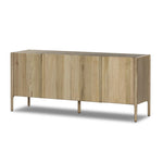Add storage to your dining space, plus a look of beautiful simplicity. Crafted of light natural oak, with cylindrical legs and rounded detailing throughout the case. Spacious inside awaits storage of favorite table linens, serveware and more. Amethyst Home provides interior design, new home construction design consulting, vintage area rugs, and lighting in the Portland metro area.