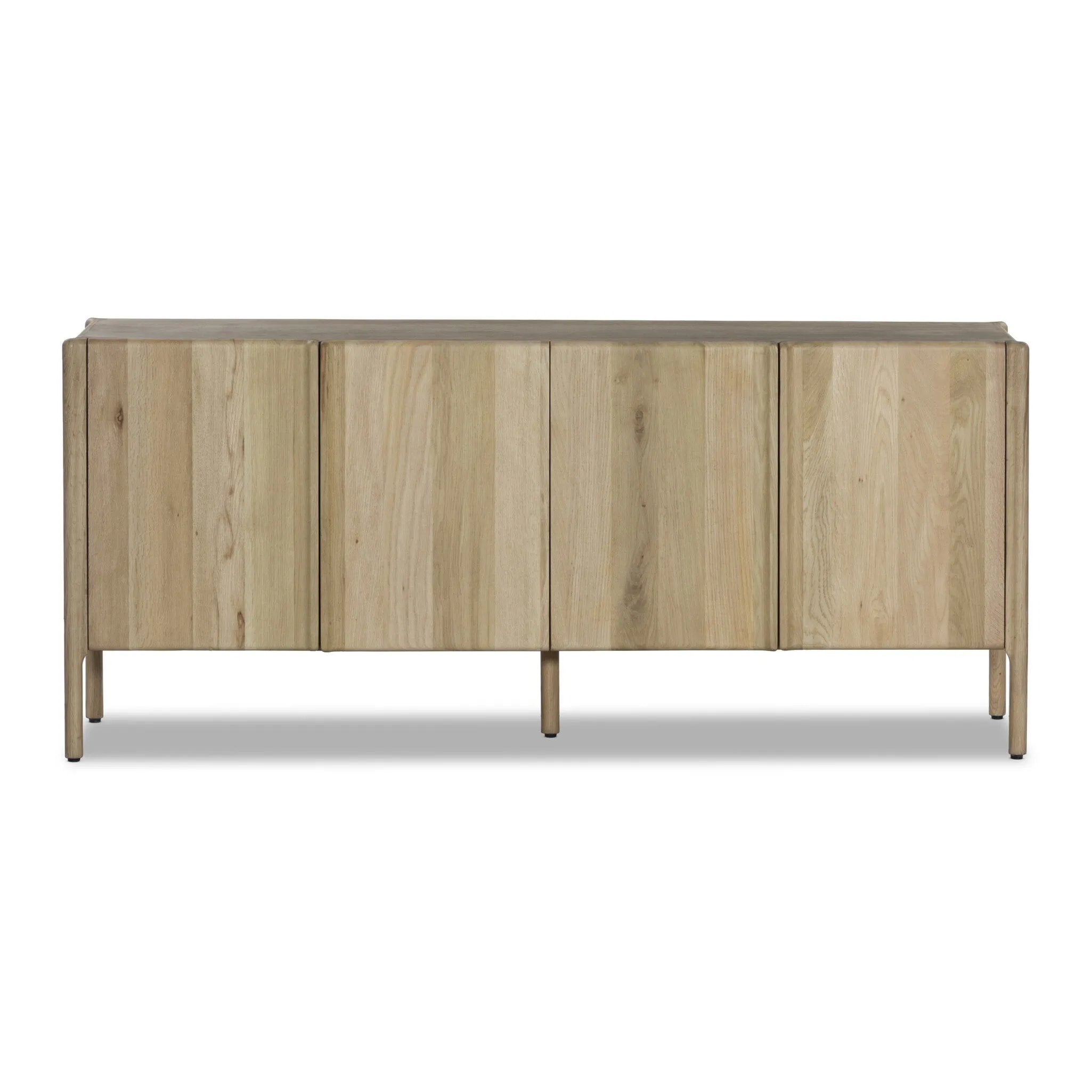 Add storage to your dining space, plus a look of beautiful simplicity. Crafted of light natural oak, with cylindrical legs and rounded detailing throughout the case. Spacious inside awaits storage of favorite table linens, serveware and more. Amethyst Home provides interior design, new home construction design consulting, vintage area rugs, and lighting in the Salt Lake City metro area.