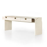 Talk about novelty. Made from painted linen in a light ivory, arched legs soften otherwise clean, modern shaping. Three drawers bring bonus storage space to the living or media room, while half-moon iron hardware adds a hint of art deco style Amethyst Home provides interior design, new home construction design consulting, vintage area rugs, and lighting in the Tampa metro area.