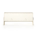 Talk about novelty. Made from painted linen in a light ivory, arched legs soften otherwise clean, modern shaping. Finished in an antique brass, half-moon iron hardware completes the look. Dual rear cutouts for cord management Amethyst Home provides interior design, new home construction design consulting, vintage area rugs, and lighting in the Des Moines metro area.