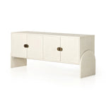 Talk about novelty. Made from painted linen in a light ivory, arched legs soften otherwise clean, modern shaping. Finished in an antique brass, half-moon iron hardware completes the look. Dual rear cutouts for cord management Amethyst Home provides interior design, new home construction design consulting, vintage area rugs, and lighting in the Houston metro area.