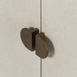 Talk about novelty. Made from painted linen in a light ivory, arched legs soften otherwise clean, modern shaping. Finished in an antique brass, half-moon iron hardware completes the look. Dual rear cutouts for cord management Amethyst Home provides interior design, new home construction design consulting, vintage area rugs, and lighting in the Miami metro area.