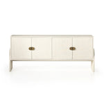Talk about novelty. Made from painted linen in a light ivory, arched legs soften otherwise clean, modern shaping. Finished in an antique brass, half-moon iron hardware completes the look. Dual rear cutouts for cord management Amethyst Home provides interior design, new home construction design consulting, vintage area rugs, and lighting in the Park City metro area.