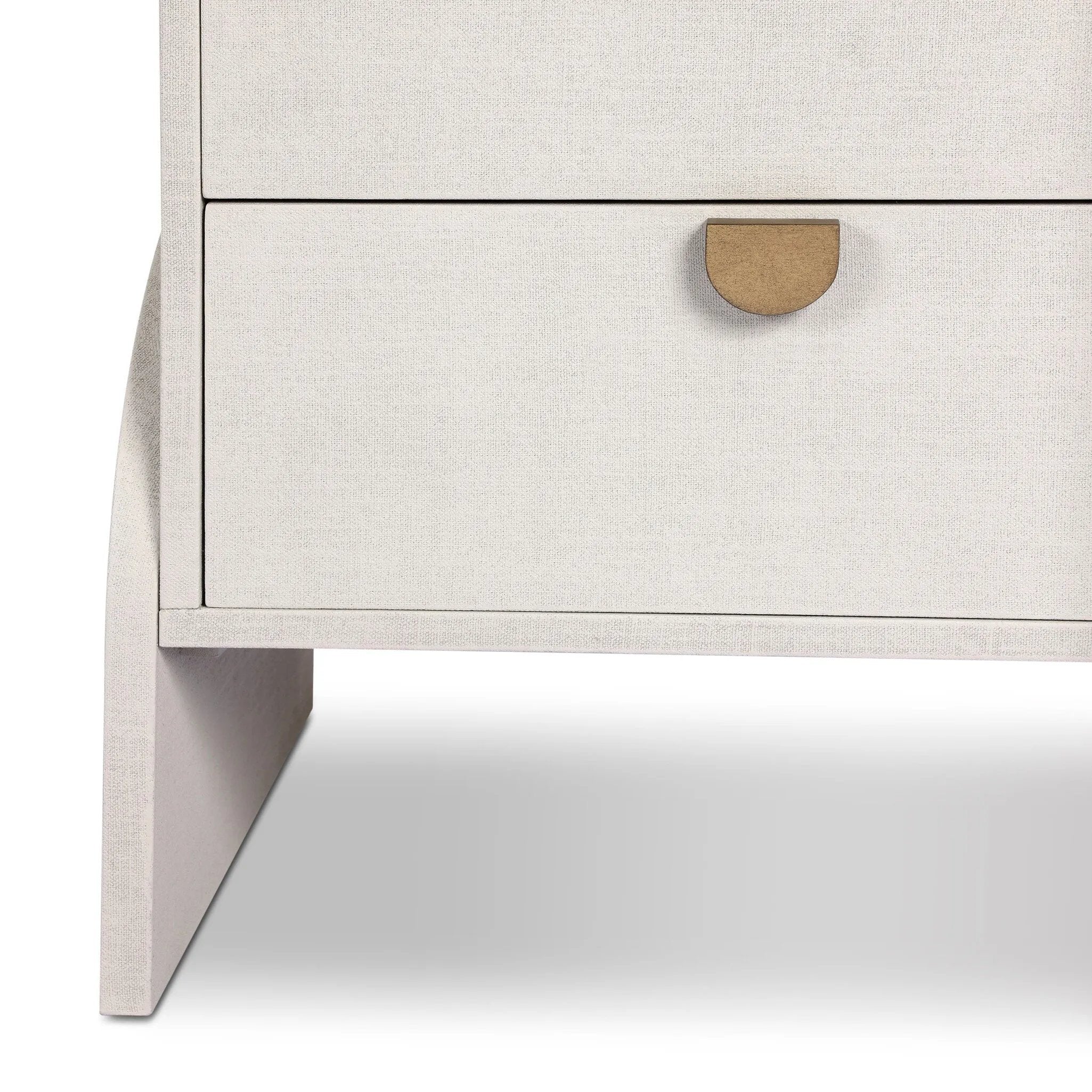 Talk about novelty. Made from painted linen in a light ivory, arched legs soften otherwise clean, modern shaping. Two drawers bring storage to the bedside while half-moon iron hardware adds a hint of art deco style Amethyst Home provides interior design, new home construction design consulting, vintage area rugs, and lighting in the Winter Garden metro area.