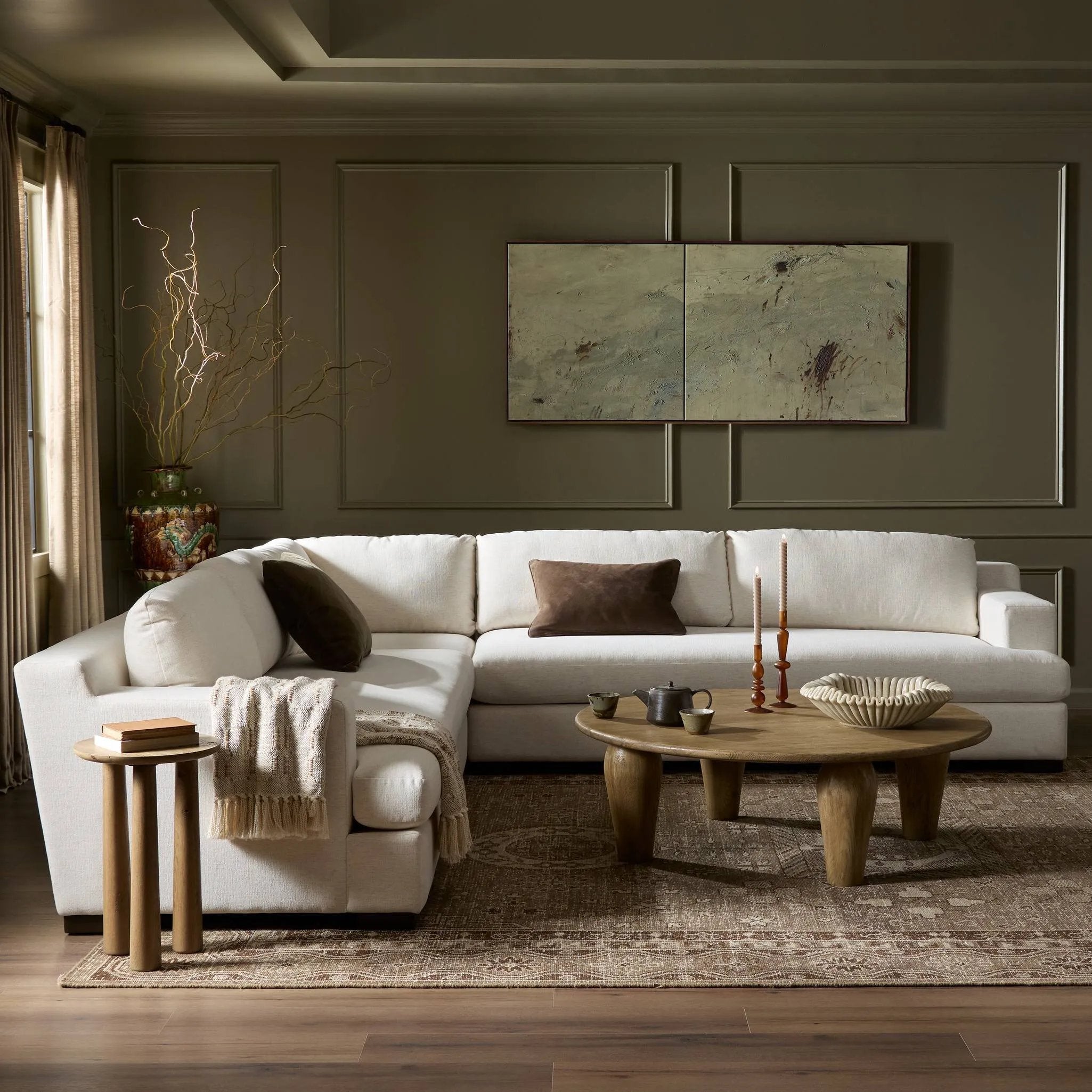 Modern shaping meets sink-in comfort for a piece that invites you and your guests to stay a little longer. The wide arms, slightly angled back and rectilinear edges on this three-piece sectional are softened with T-shaped cushions and an exaggerated bench-style seating in soft foam. Amethyst Home provides interior design, new home construction design consulting, vintage area rugs, and lighting in the Los Angeles metro area.