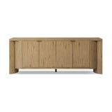 Featuring Cristopher Rubbed Light Oak Veneer Sideboard by Four Hands at Amethyst Home. A playful placement of rounded shapes and clean lines, this sideboard captivates with half-cylinder legs seamlessly blending into the storage case and top, complete with curved metal hardware. Finished in light oak for warm, light look that can move between styles with e. Amethyst Home provides interior design, new home construction design consulting, vintage area rugs, and lighting in the Alpharetta metro area.