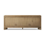 Featuring Cristopher Rubbed Light Oak Veneer Sideboard by Four Hands at Amethyst Home. A playful placement of rounded shapes and clean lines, this sideboard captivates with half-cylinder legs seamlessly blending into the storage case and top, complete with curved metal hardware. Finished in light oak for warm, light look that can move between styles with ea. Amethyst Home provides interior design, new home construction design consulting, vintage area rugs, and lighting in the Calabasas metro area.