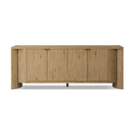 Featuring Cristopher Rubbed Light Oak Veneer Sideboard by Four Hands at Amethyst Home. A playful placement of rounded shapes and clean lines, this sideboard captivates with half-cylinder legs seamlessly blending into the storage case and top, complete with curved metal hardware. Finished in light oak for warm, light look that can move between styles with ea. Amethyst Home provides interior design, new home construction design consulting, vintage area rugs, and lighting in the Charlotte metro area.