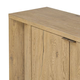 Featuring Cristopher Rubbed Light Oak Veneer Sideboard by Four Hands at Amethyst Home. A playful placement of rounded shapes and clean lines, this sideboard captivates with half-cylinder legs seamlessly blending into the storage case and top, complete with curved metal hardware. Finished in light oak for warm, light look that can move between styles with ea. Amethyst Home provides interior design, new home construction design consulting, vintage area rugs, and lighting in the Nashville metro area.