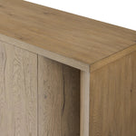 Featuring Cristopher Rubbed Light Oak Veneer Sideboard by Four Hands at Amethyst Home. A playful placement of rounded shapes and clean lines, this sideboard captivates with half-cylinder legs seamlessly blending into the storage case and top, complete with curved metal hardware. Finished in light oak for warm, light look that can move between styles wi. Amethyst Home provides interior design, new home construction design consulting, vintage area rugs, and lighting in the Salt Lake City metro area.