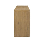 Featuring Cristopher Rubbed Light Oak Veneer Sideboard by Four Hands at Amethyst Home. A playful placement of rounded shapes and clean lines, this sideboard captivates with half-cylinder legs seamlessly blending into the storage case and top, complete with curved metal hardware. Finished in light oak for warm, light look that can move between styles with e. Amethyst Home provides interior design, new home construction design consulting, vintage area rugs, and lighting in the Scottsdale metro area.