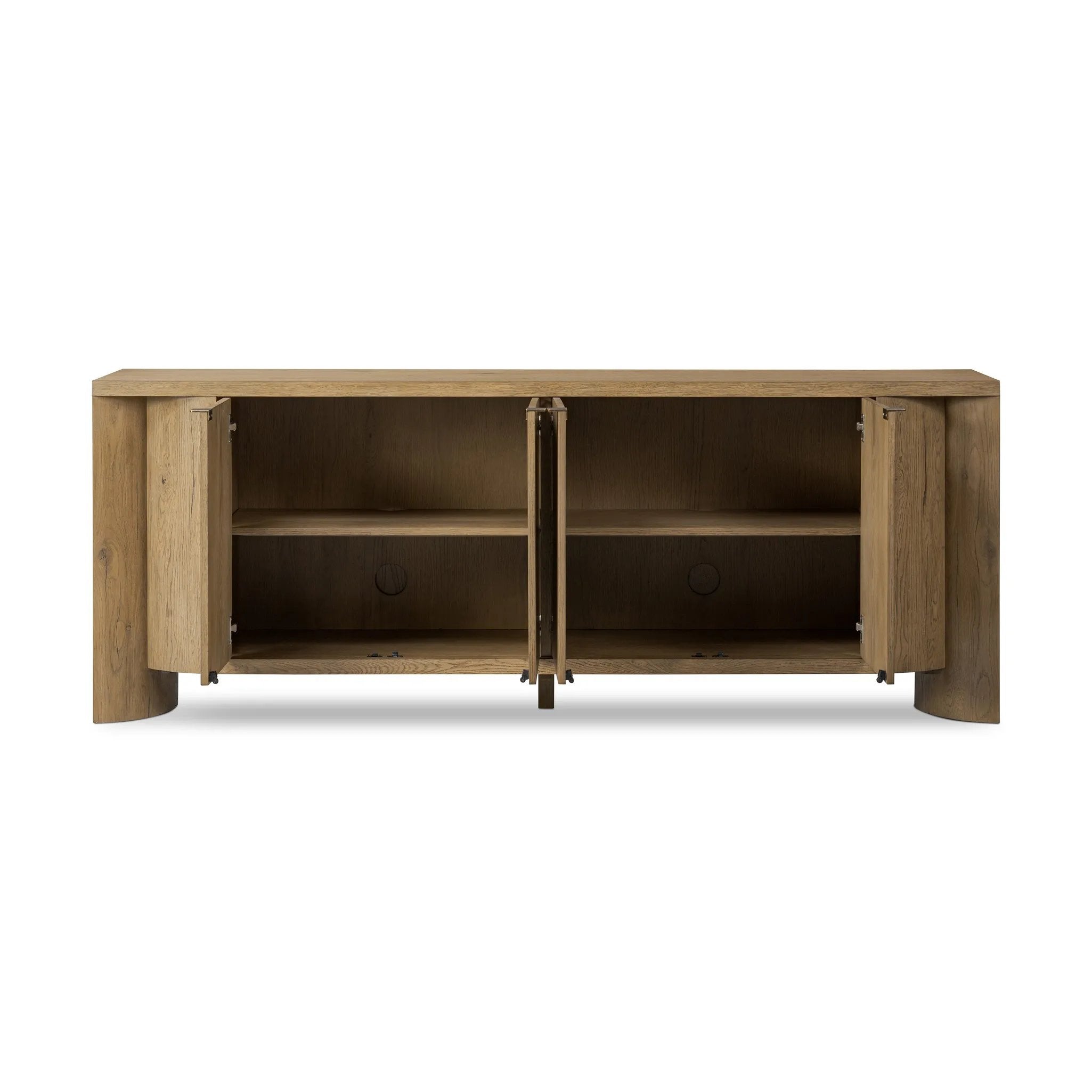 Featuring Cristopher Rubbed Light Oak Veneer Sideboard by Four Hands at Amethyst Home. A playful placement of rounded shapes and clean lines, this sideboard captivates with half-cylinder legs seamlessly blending into the storage case and top, complete with curved metal hardware. Finished in light oak for warm, light look that can move between styles wit. Amethyst Home provides interior design, new home construction design consulting, vintage area rugs, and lighting in the Winter Garden metro area.
