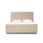 This heritage-style bed reimagines the classic sleigh silhouette. Cream-colored, linen-like fabric slipcover is both removable and washable for practicality. Turned feet in brown parawood peek from under the slip, grounding the bed's stately charm. A design collaboration by Amber Lewis and Four Hands. Amethyst Home provides interior design, new home construction design consulting, vintage area rugs, and lighting in the Charlotte metro area.