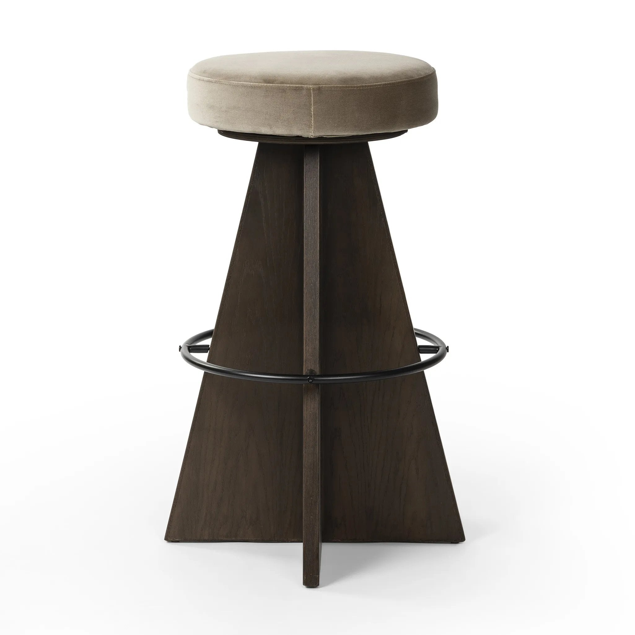 Featuring Damon Sapphire Khaki  Swivel Bar + Counter Stool by Four Hands at Amethyst Home. Large angular panels merge to form a geometrically inspired base in this modern counter stool. The circle metal ring around the base serves as a footrest, while the round upholstered cushion provides comfortable seating. The 360-degree swivel function adds versatility, a. Amethyst Home provides interior design, new home construction design consulting, vintage area rugs, and lighting in the Austin metro area.