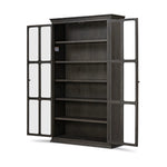 Featuring Dawes Smoked Black Oak Cabinet by Four Hands at Amethyst Home. Work the timeless charm of a vintage find into your collection. Smoked black oak cabinetry features softened mullions and rounded glass panels, with aged bronze barrel hinges and finial detailing. Generous storage and display options empower you to create a space that tells your story. Amethyst Home provides interior design, new home construction design consulting, vintage area rugs, and lighting in the Des Moines metro area.