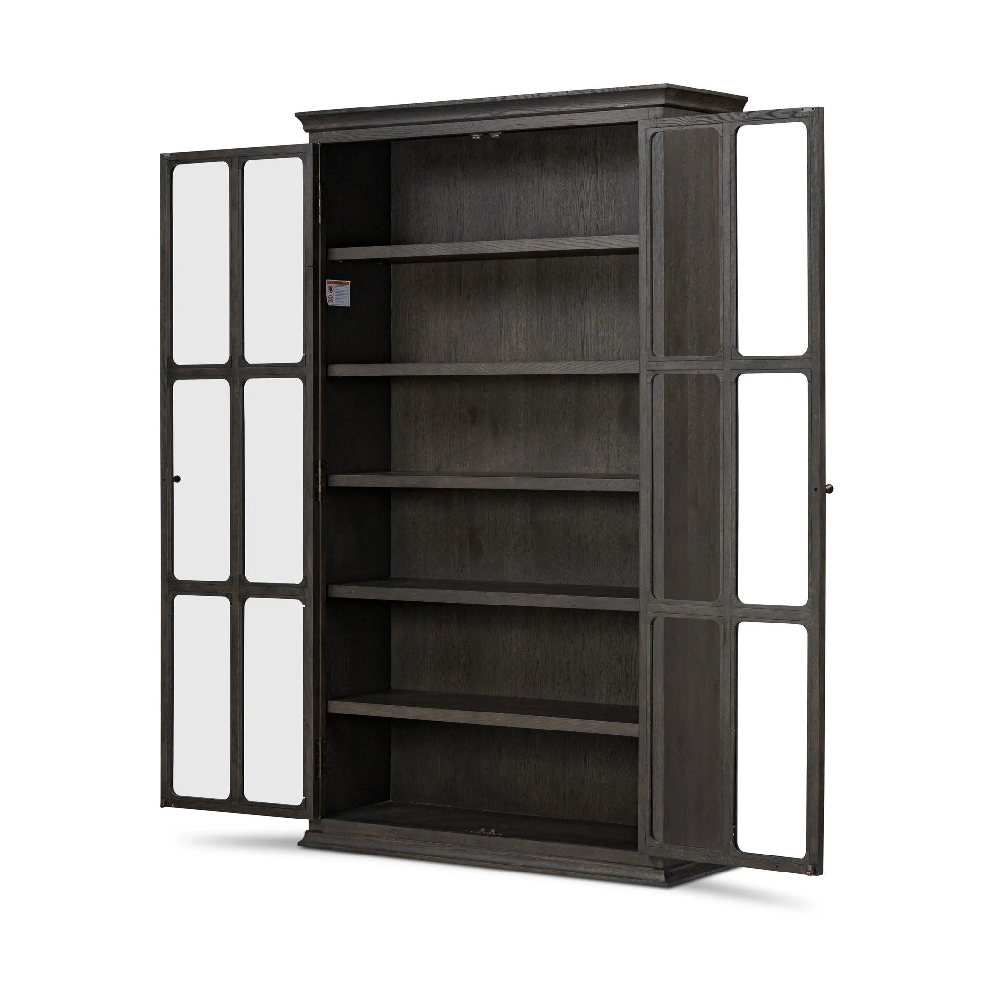 Featuring Dawes Smoked Black Oak Cabinet by Four Hands at Amethyst Home. Work the timeless charm of a vintage find into your collection. Smoked black oak cabinetry features softened mullions and rounded glass panels, with aged bronze barrel hinges and finial detailing. Generous storage and display options empower you to create a space that tells your story. Amethyst Home provides interior design, new home construction design consulting, vintage area rugs, and lighting in the Des Moines metro area.