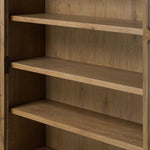 Featuring Dawes Weathered Oak Cabinet by Four Hands at Amethyst Home. Work the timeless charm of a vintage find into your collection. Weathered oak cabinetry features softened mullions and rounded glass panels, with aged bronze barrel hinges and finial detailing. Generous storage and display options  empower you to create a space that tells your story.O. Amethyst Home provides interior design, new home construction design consulting, vintage area rugs, and lighting in the Newport Beach metro area.